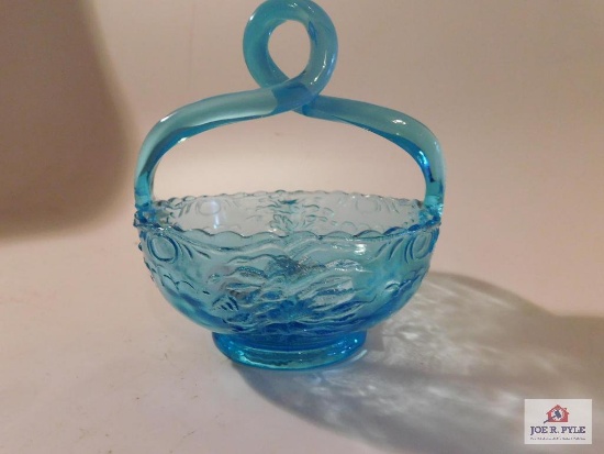 Blue bowl twisted handle . Dated on bottom March 18, 1902