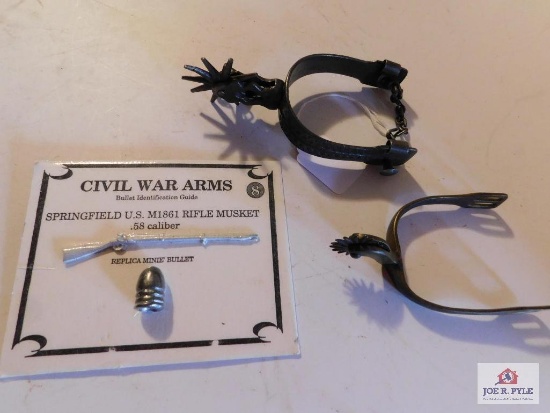 2 Old Cowboy Spurs and Civil war arms bullet and rifle