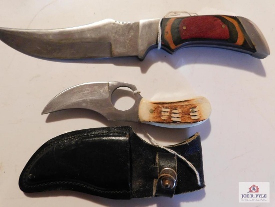 2 knives (1) hunting knife white tail (1) skinning knife with Sheath Both Good Knives