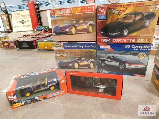4 model kits in original box and plastic, 2 die cast corvettes
