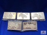 FIVE 2.5OZ STERLING BARS WITH OLD TIMEY VEHICLES