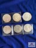 SIX US SILVER EAGLE COINS UNGRADED, VARIOUS YEARS