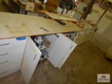 White Cabinetry with nuts, bolts, screws, fasteners, etc.