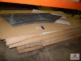Pile of various lumber sheets