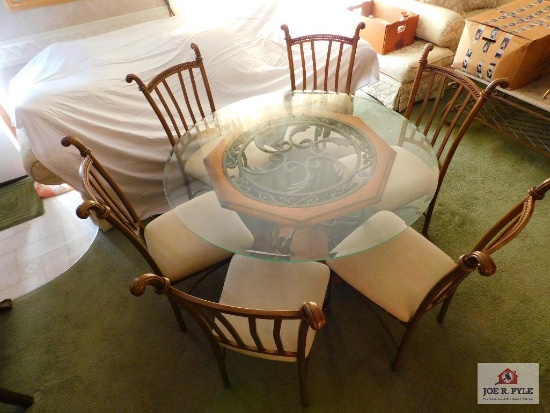 Glass top table, iron and wood base, w/ 6 chairs 4ft top