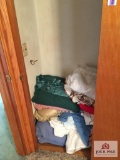 Contents of closet: Sheets, blankets, afghans, etc.