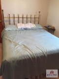 Double bed with metal headboard (mattress needs cleaned)