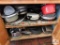 Contents of cabinet pots, baking pans
