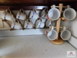 2 sets of cups and racks
