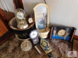 Collection of clocks and large planter