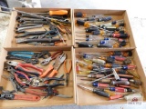 Flats of screwdrivers, pliers, wrenches
