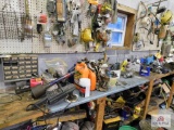 Contents of wall and bench , bench vise, drill bits, bolts, screws, etc.