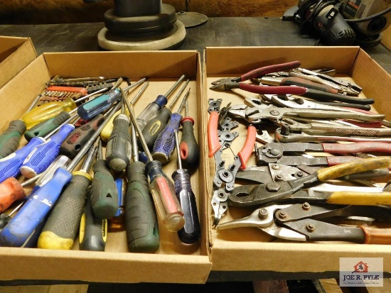 Wire cutters, pliers, and screw drivers