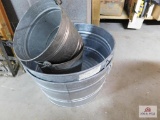 2 galvanized tubs and buckets