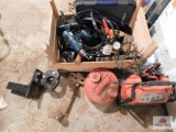 Hitches, battery charger, cables, drills, gas can, hammers