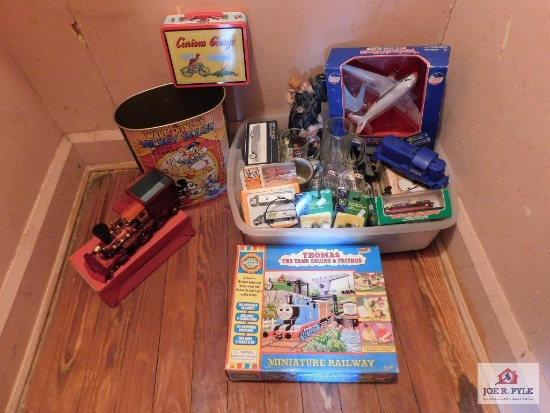 Contents of closet, Thomas the Train, miniature railroad, A & W mugs, Curious George lunch box