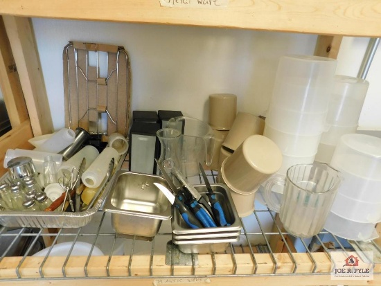 Group of kitchen accessories, dressing containers, napkin holders, salt and pepper shakers, storage