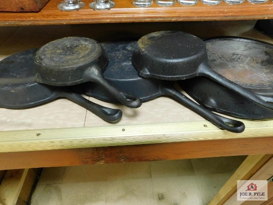 Collection of iron skillets - Tomlinson