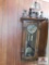 Ornate clock w/ engraved pendulum and weights w/ key