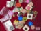 Bag of miscellaneous pins, tokens, wooden coins, matchbook and other items