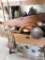 Trunk with an assortment of wooden pieces - rug beaters, bowls, shoe stretchers