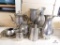 Pewter pitchers, vases and creamers