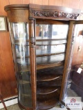 Antique oak - curved glass cabinet w/ claw feet