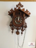 Very ornate cuckoo clock w/ weights
