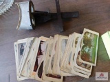 Antique viewer with large group of cards