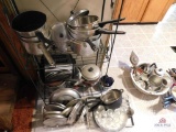 Collection of pots and pans, kitchen utensils, glasses
