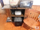 Toaster oven, paper shredder, DVD player, chair