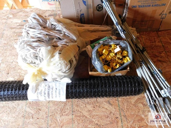 Electric Fencing, Electric Fencing Posts, and a Roll of Black Plastic Fence