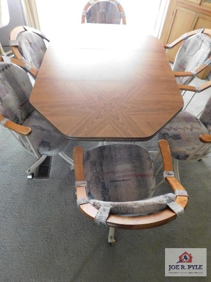 Dinette Table and Swivel Chairs
