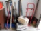 Group of snow shovels, brooms, axe, sledgehammer, pet keepers and dolly