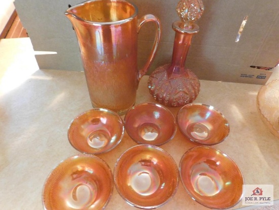 Carnival glass bowls, pitcher, decanter