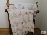 Quilt rack & 2 much loved quilts