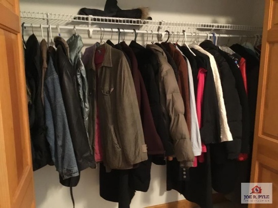 Contents of closet: mostly winter clothing men's and women's