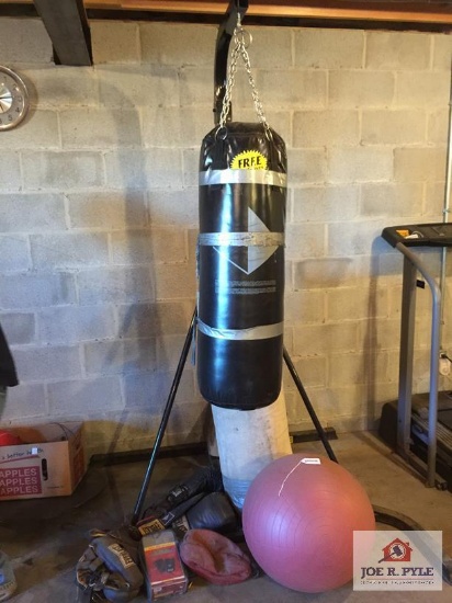 Hanging punching bag with gloves and equipment