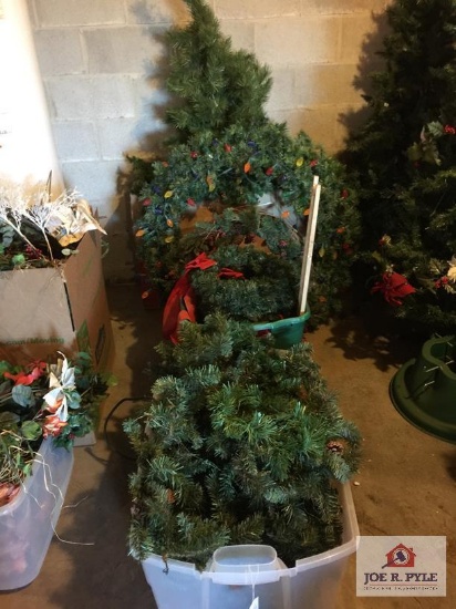 Lot of Christmas greenery: wreaths, swags, etc.