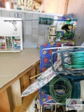 Contents of cabinet, hoses, waterproofing chairs