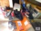 large lot under table: truck hitches, windshield wipers, saw blades, nails, etc..