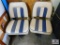 2 boat seats on a metal base