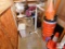 contents of closet: 5 gallon buckets, fans, 4ft. Section of countertop, rolling carry-on luggage,