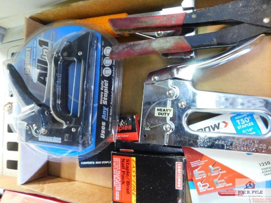 lot of staple gun and staples