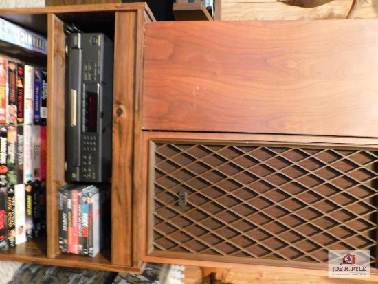 tv stand with speakers and movies