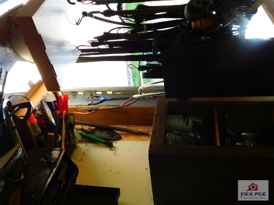 large lot of ratchet straps, tie downs, and contents of cabinet