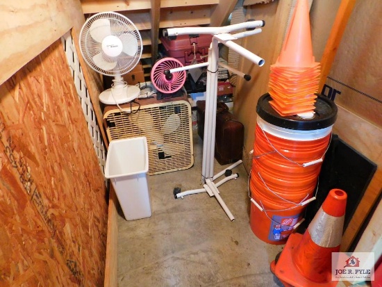 contents of closet: 5 gallon buckets, fans, 4ft. Section of countertop, rolling carry-on luggage,
