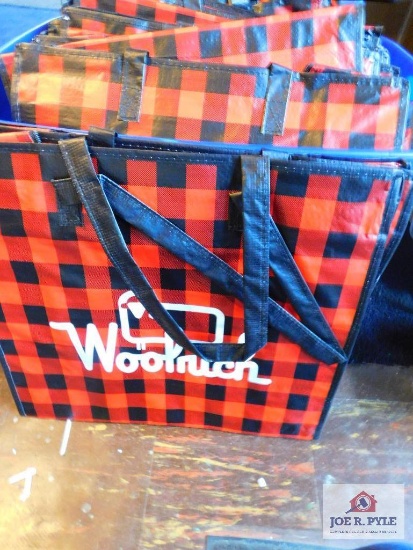 tote of Woolrich bags
