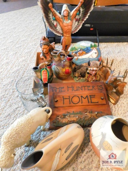 collection of Indian statues and pottery