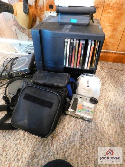 cd's and player with cd rack